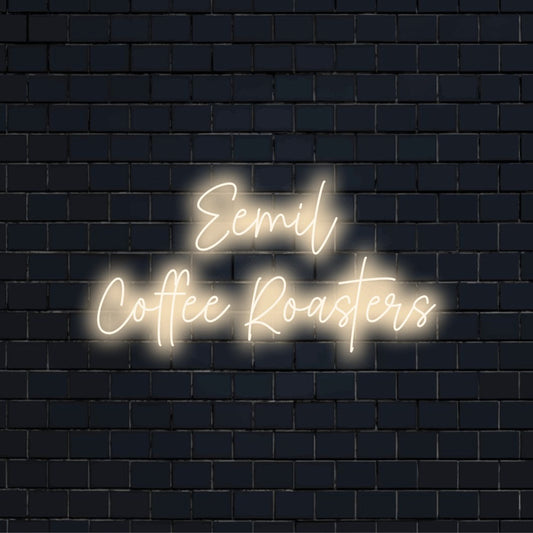 Eemil Coffee Roasters Personalized LED Neon Sign, bright neon lettering on dark brick background