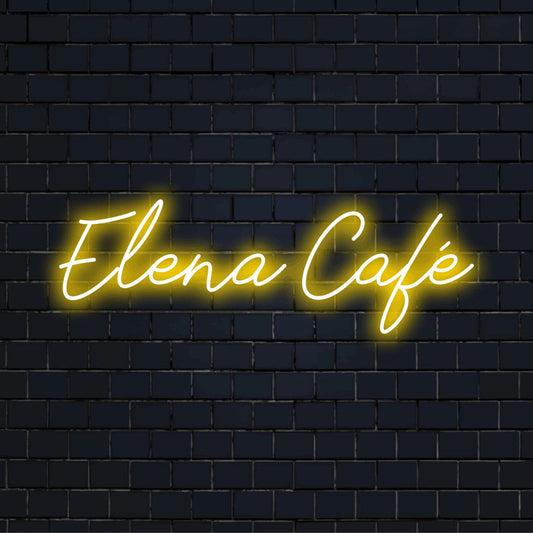 Elena Cafe Personalized Neon Light with soft neon glow on dark brick wall