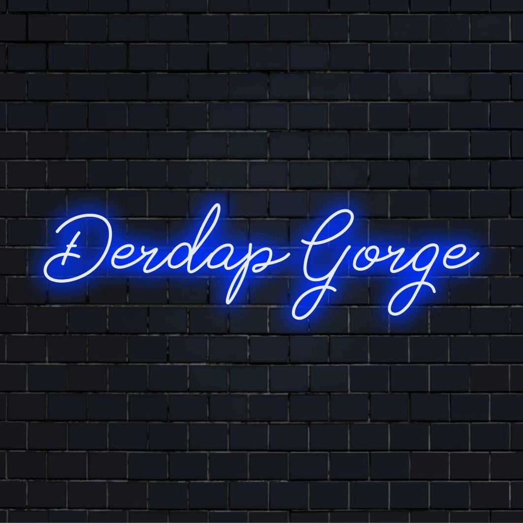 Erdap Gorge LED Neon Sign, bright neon glow on dark brick wall