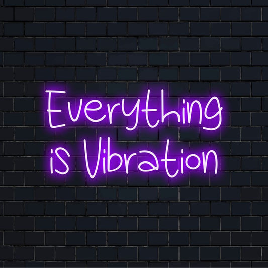 Everything Is Vibration Neon Sign, glowing wall decor against black brick wall