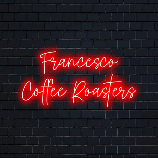 Francesco Coffee Roasters Personalized Neon Light with neon text light on black brick background