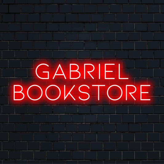 Gabriel Bookstore Personalized Neon Light with bright LED glow on dark brick wall
