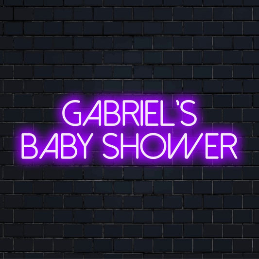 Gabriel_s Baby Shower Custom Name Neon Sign, glowing wall decor on dark brick wall