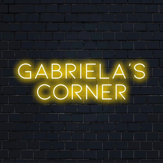 Gabriela_s Corner Custom Name Neon Sign, bright neon lettering against brick backdrop