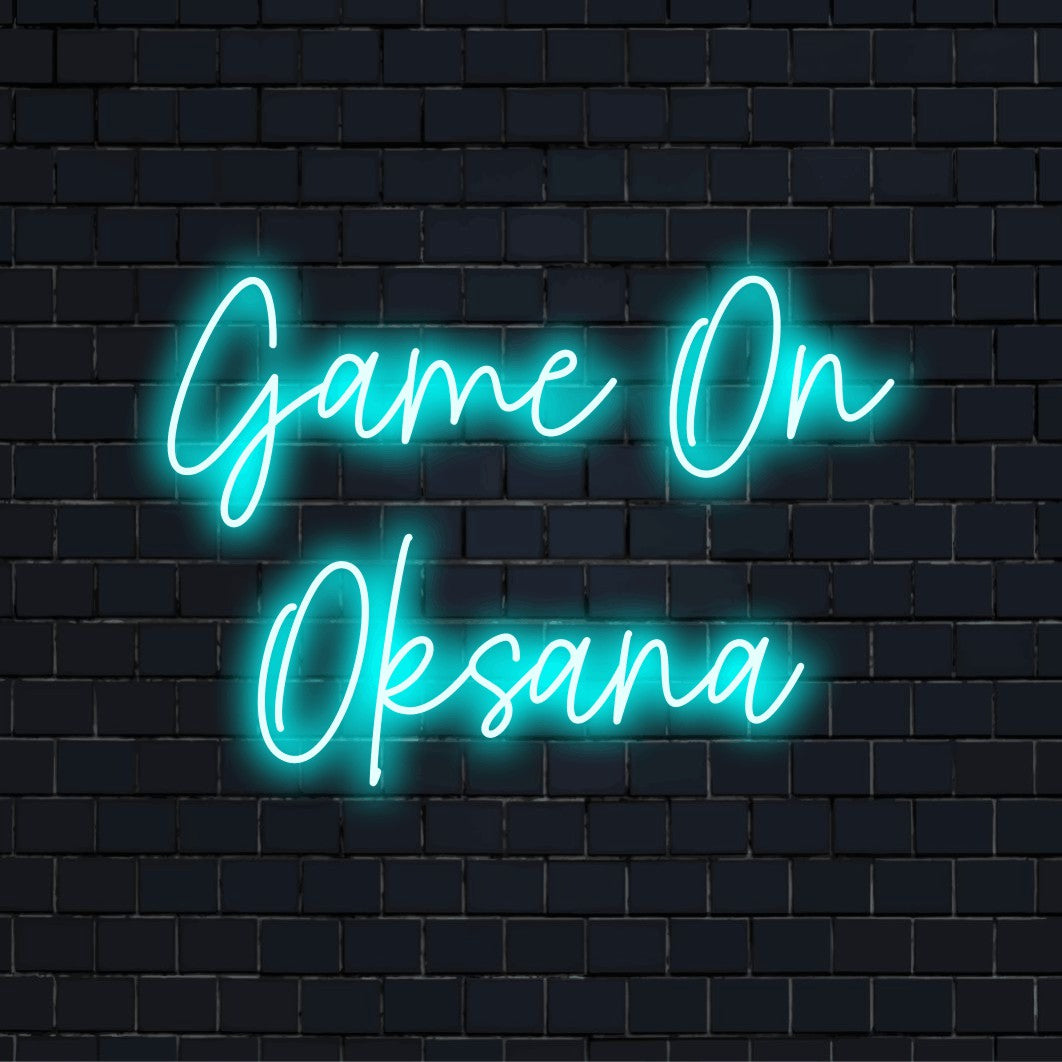 Game On Oksana Personalized LED Neon Sign, soft neon glow on dark brick background