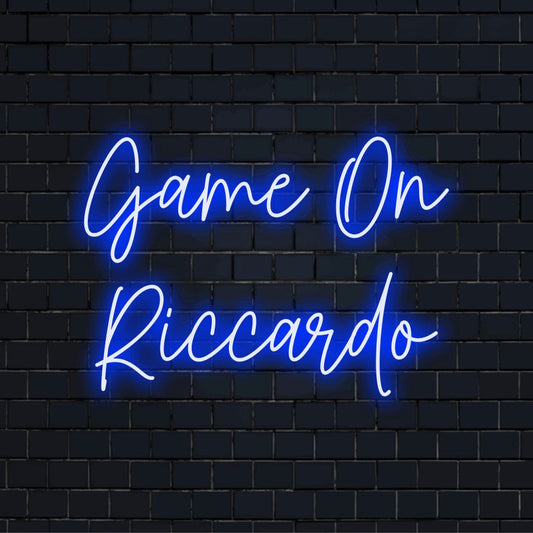 Game On Riccardo Personalized LED Neon Sign, bright LED glow on black brick background