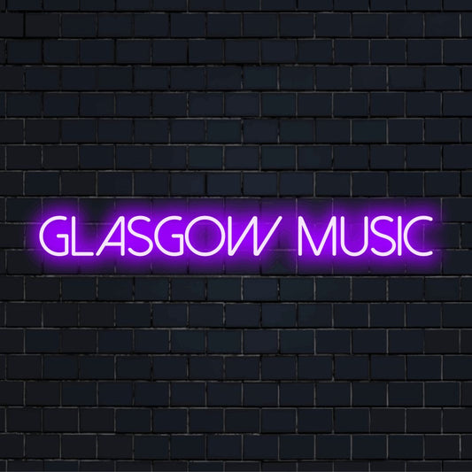 Glasgow Music Neon Sign, glowing neon text on dark brick wall