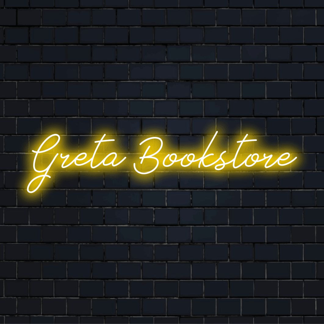 Greta Bookstore Custom Name Neon Sign, bright LED glow against black brick wall