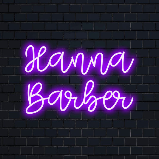 Hanna Barber Custom Name Neon Sign, bright neon lettering on dark brick wall