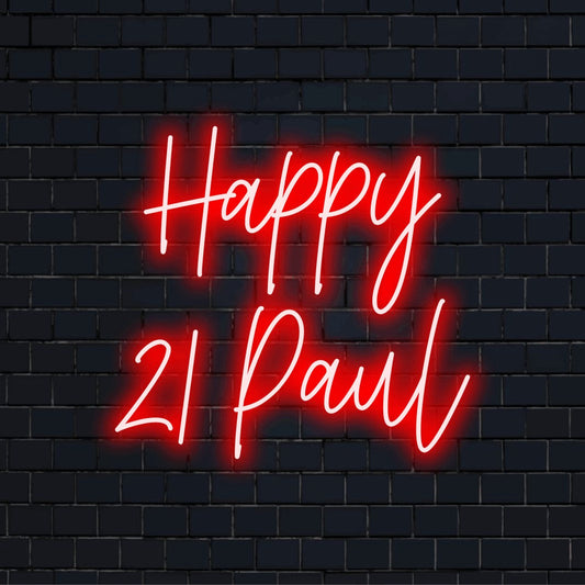 Happy 21 Paul Personalized Neon Light with bright neon glow against brick backdrop