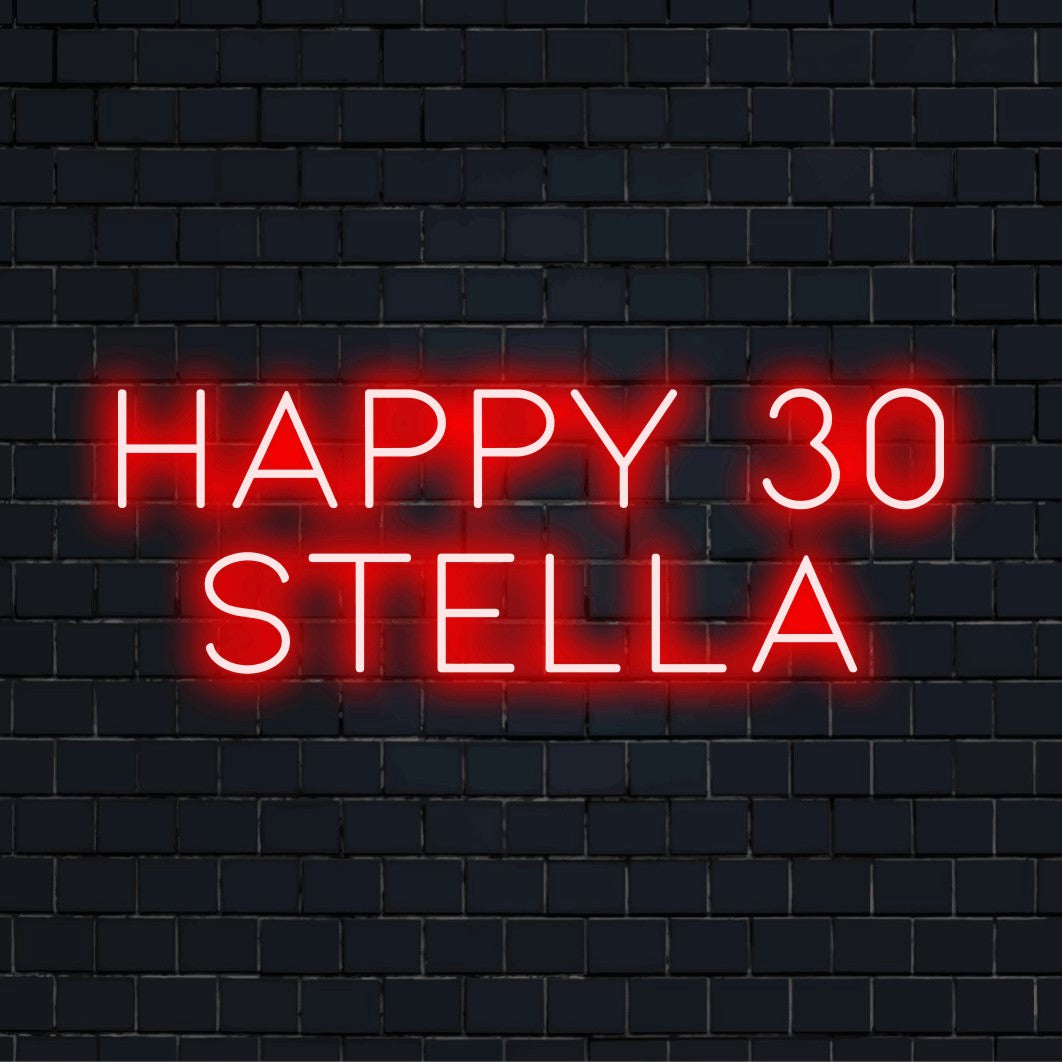 Happy 30 Stella Custom Name Neon Sign, bright LED glow against black brick wall