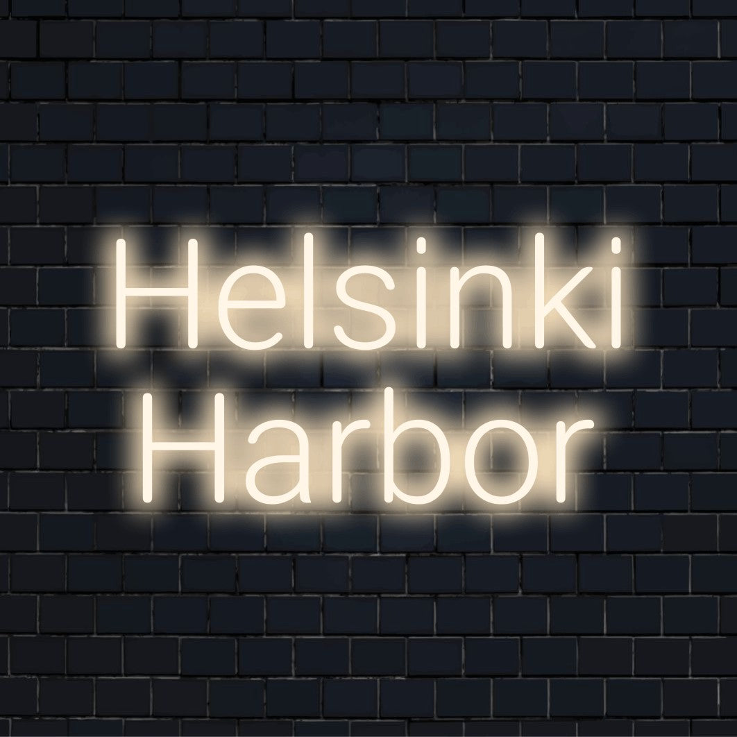Helsinki Harbor Neon Sign, bright neon lettering against brick backdrop