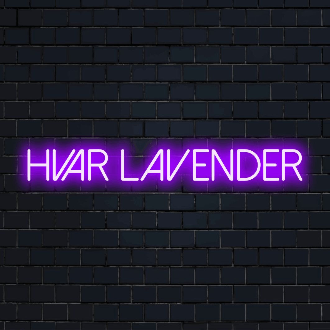 Hvar Lavender Neon Light with soft neon glow against brick backdrop