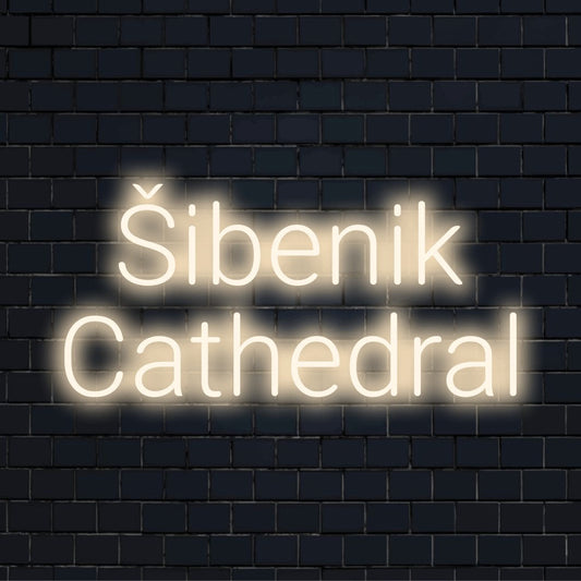 Ibenik Cathedral LED Neon Sign, glowing lettering against black brick wall