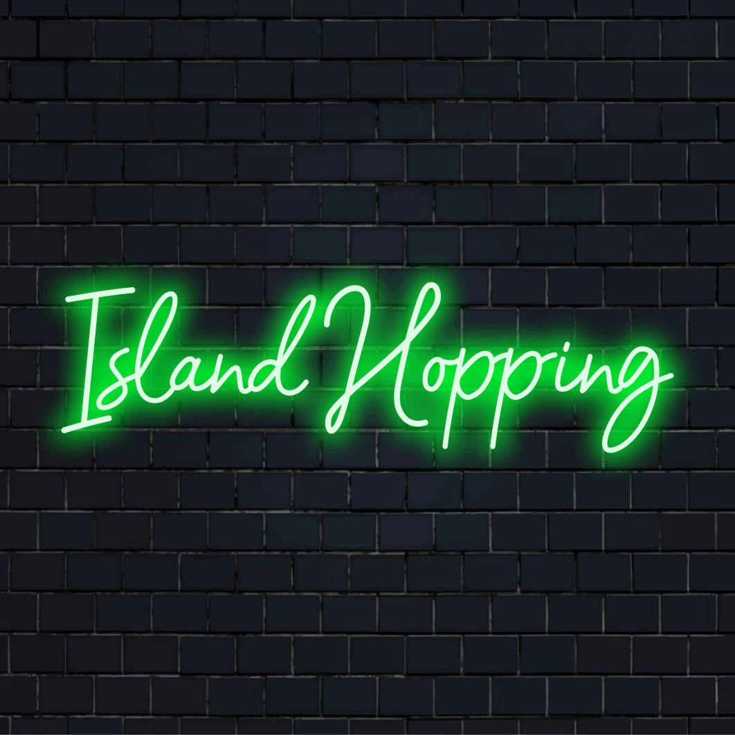 Island Hopping LED Neon Sign, bright neon lettering on black brick background