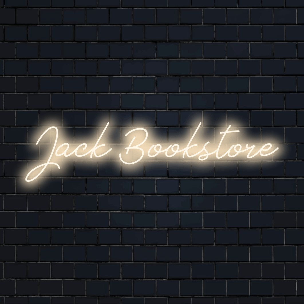 Jack Bookstore Custom Name Neon Sign, neon text light on dark brick wall