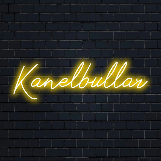 Kanelbullar LED Neon Sign, glowing lettering against brick backdrop