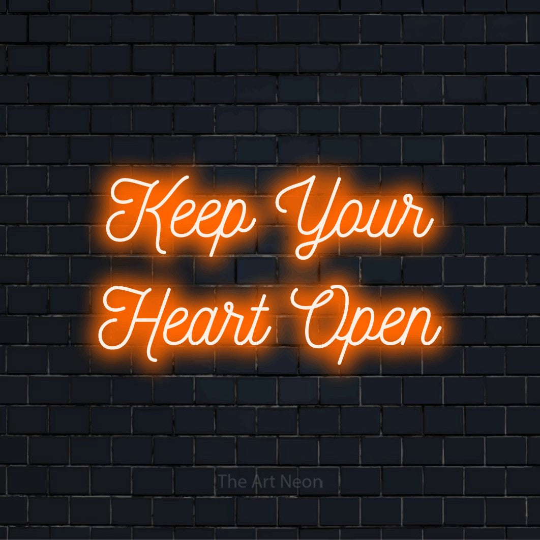 "Keep Your Heart Open" text design with neon effect on a black brick wall