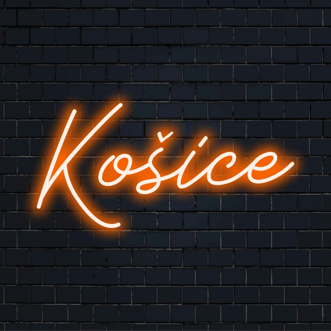 Ko Ice Neon Light with glowing wall decor on dark brick wall