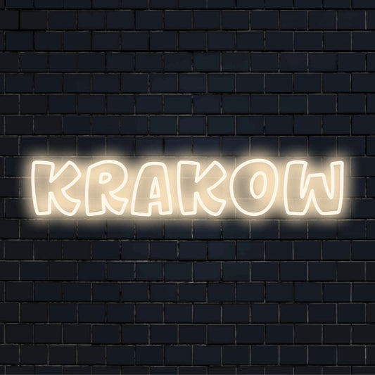 Krakow Neon Sign, neon text light against brick backdrop