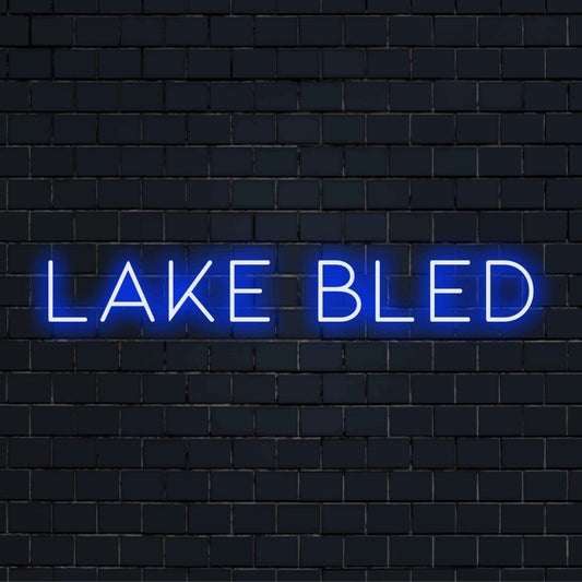 Lake Bled Neon Sign, soft neon glow on dark brick wall