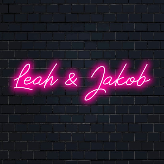 Leah _ Jakob Personalized LED Neon Sign, bright neon glow on dark brick wall