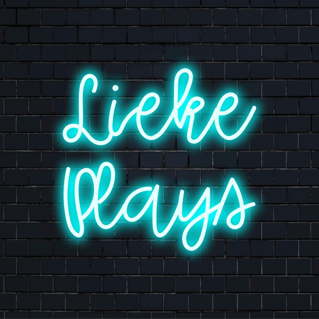 Lieke Plays Personalized LED Neon Sign, bright LED glow on dark brick background