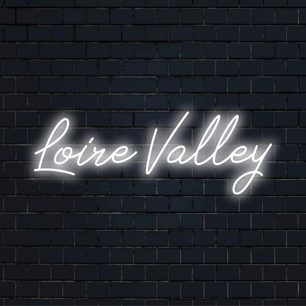 Loire Valley Neon Sign, soft neon glow on black brick background
