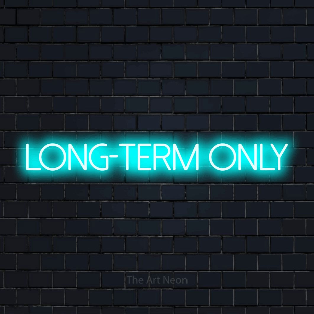 "Long-term Only" script-style LED neon sign on a black brick wall