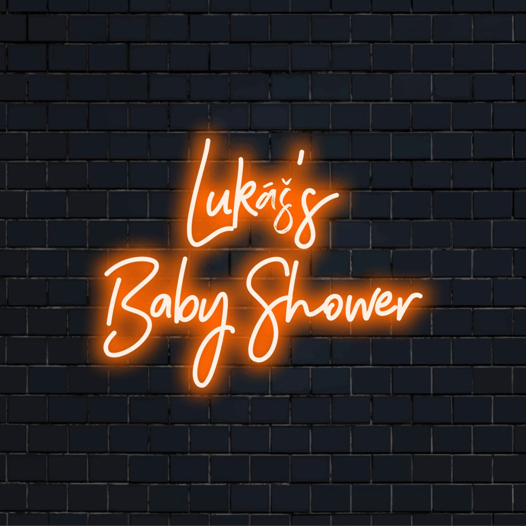 Lukas_s Baby Shower Custom Name Neon Sign, bright neon glow on dark brick wall