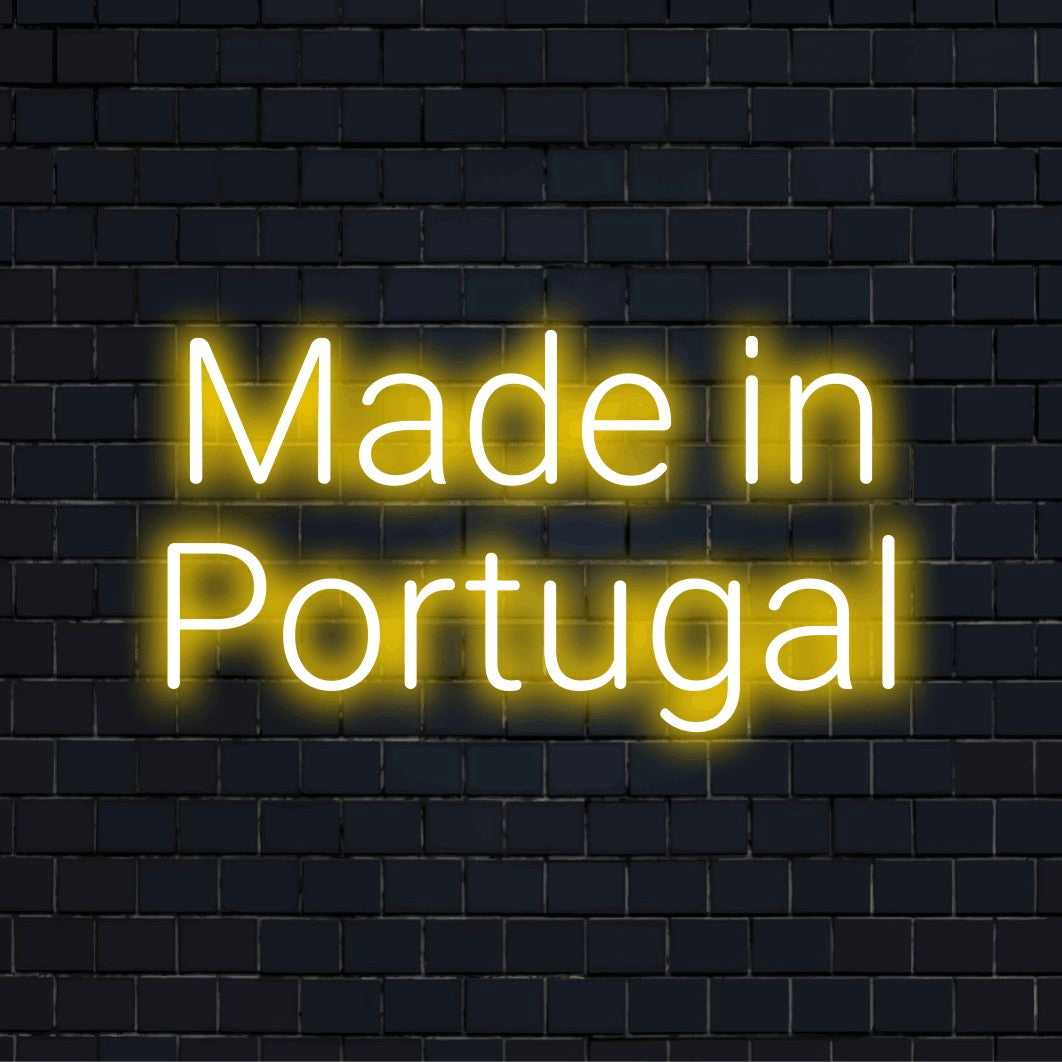 Made In Portugal Neon Sign, glowing neon text against brick backdrop