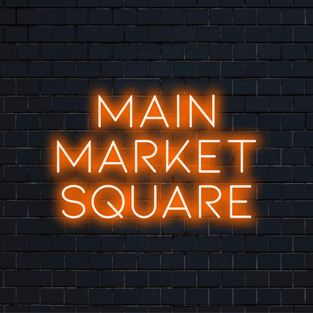 Main Market Square Neon Sign, bright neon glow against black brick wall