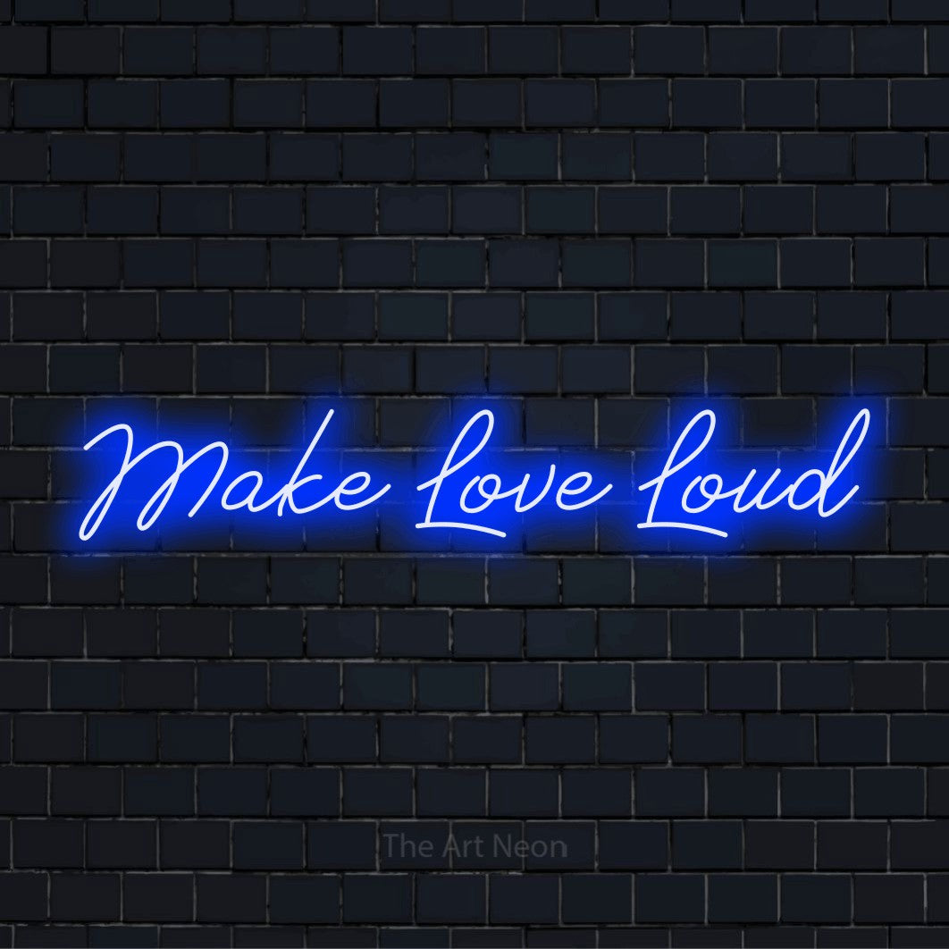 "Make Love Loud" glowing LED neon sign on a black brick wall