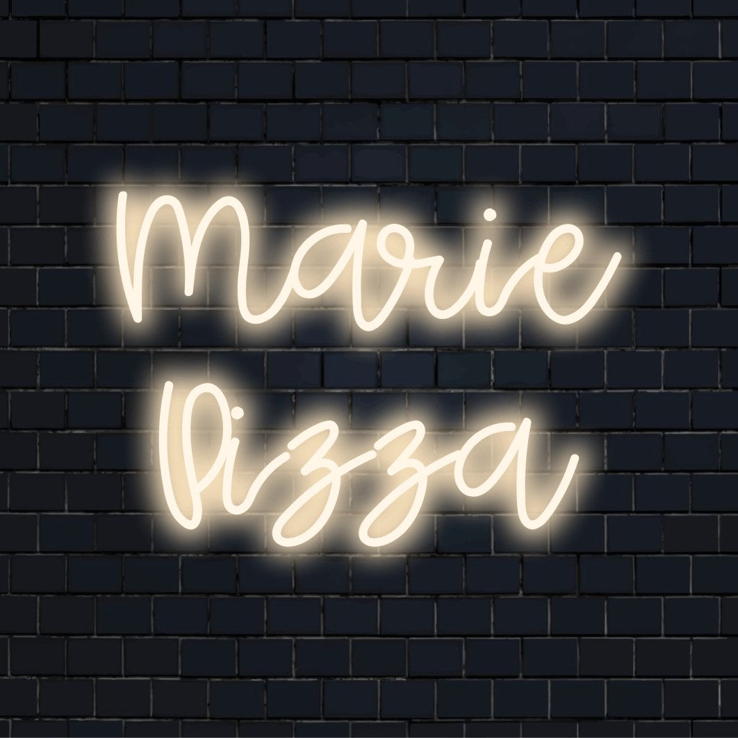Marie Pizza Custom Name Neon Sign, bright neon lettering against brick backdrop