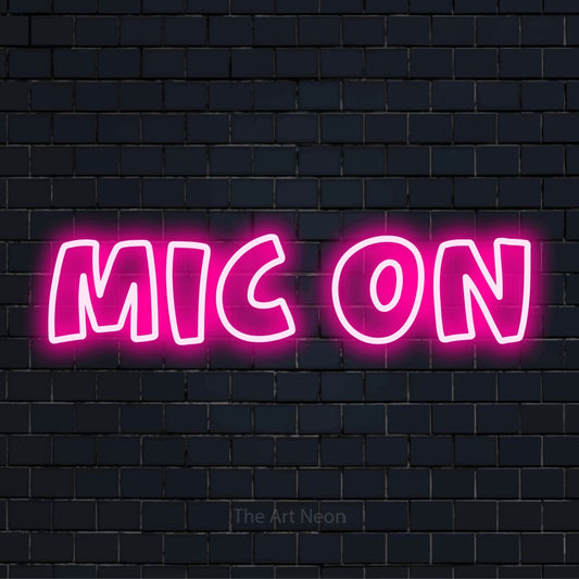 "Mic On" LED neon sign on a black brick wall