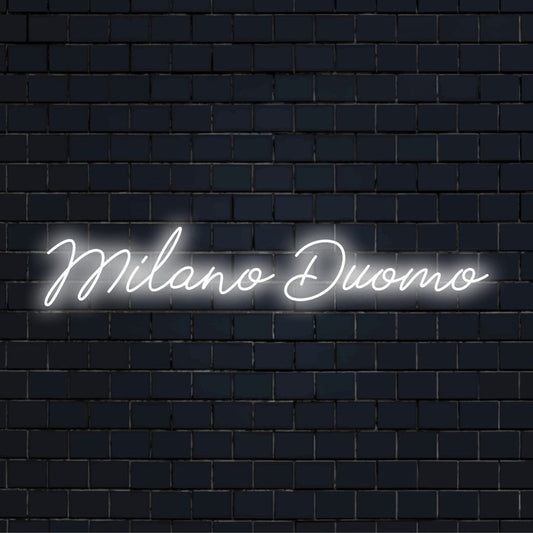 Milano Duomo Neon Sign, glowing lettering on black brick background