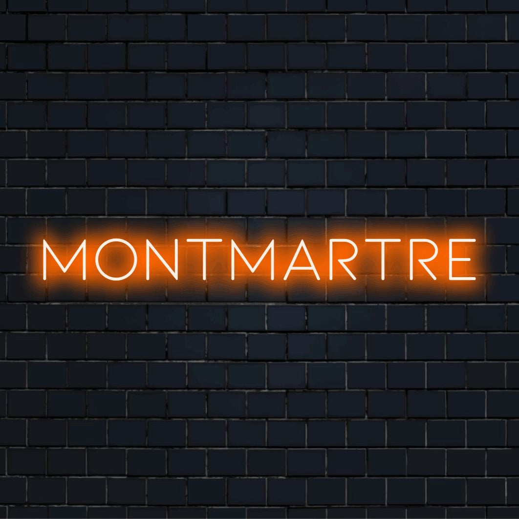 Montmartre Neon Sign, bright LED glow on dark brick background