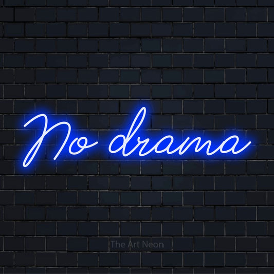 "No Drama" neon text design on a black brick wall