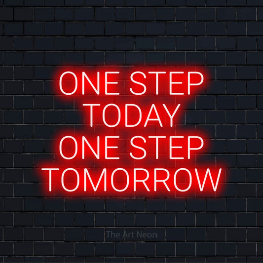 "One Step Today One Step Tomorrow" LED neon sign on a black brick wall