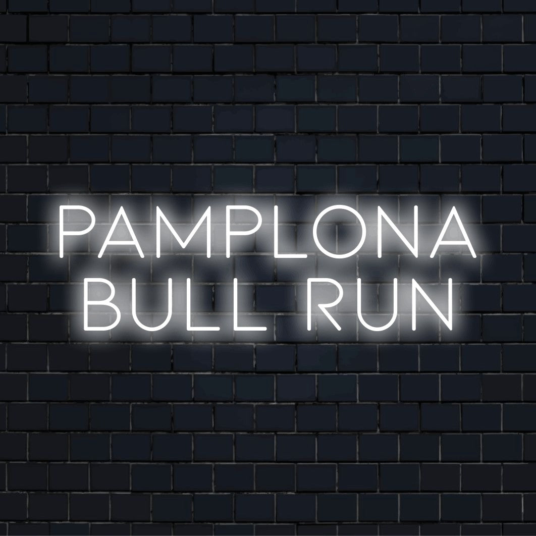 Pamplona Bull Run LED Neon Sign, soft neon glow against brick backdrop