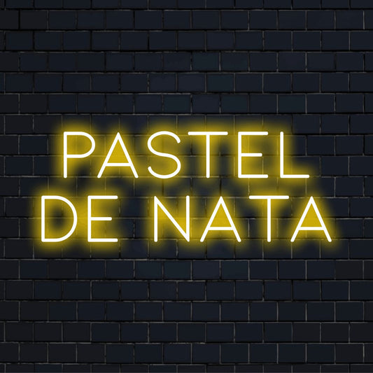 Pastel De Nata Neon Light with glowing neon text on dark brick background
