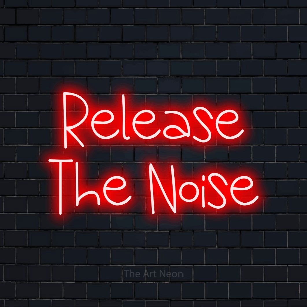 "Release The Noise" glowing LED neon sign on a black brick wall