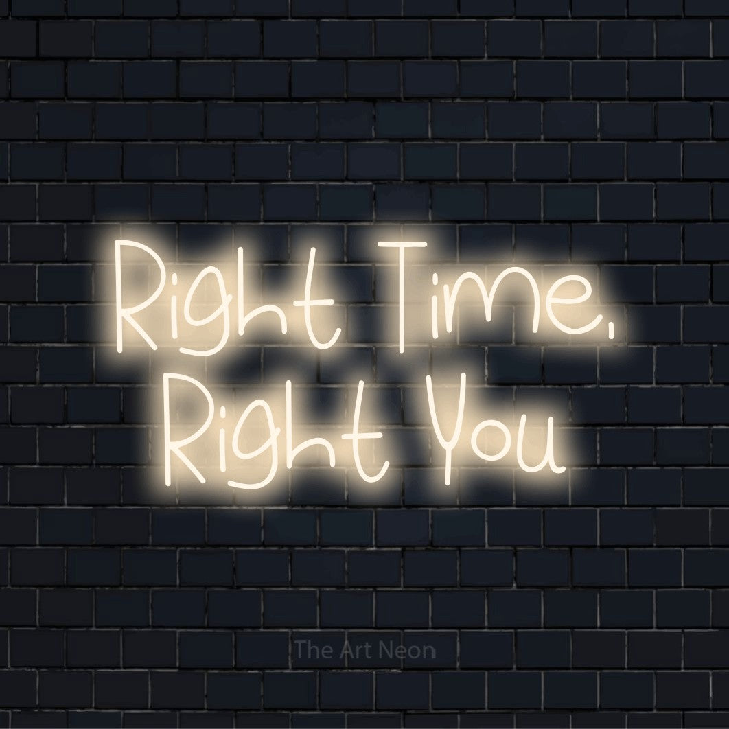 "Right Time, Right You" neon text design on a black brick wall