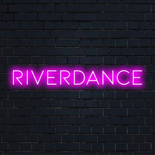 Riverdance Neon Sign, glowing lettering on dark brick background