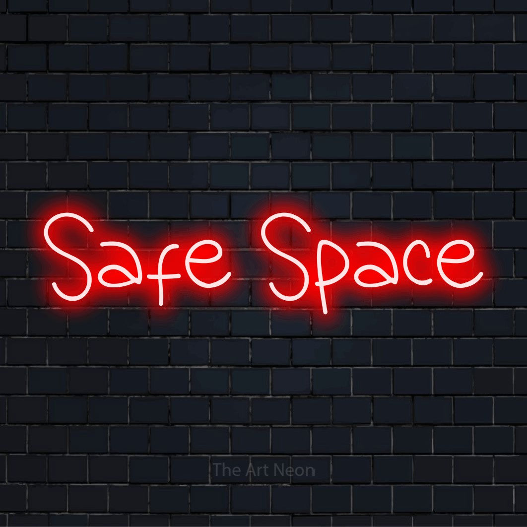 "Safe Space" neon text design on a black brick wall