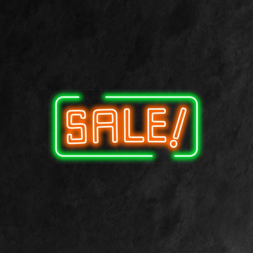 Silmiinpistävä neonkyltti, jossa näkyy sana "Sale" lihavoituina, hehkuvin kirjaimin.