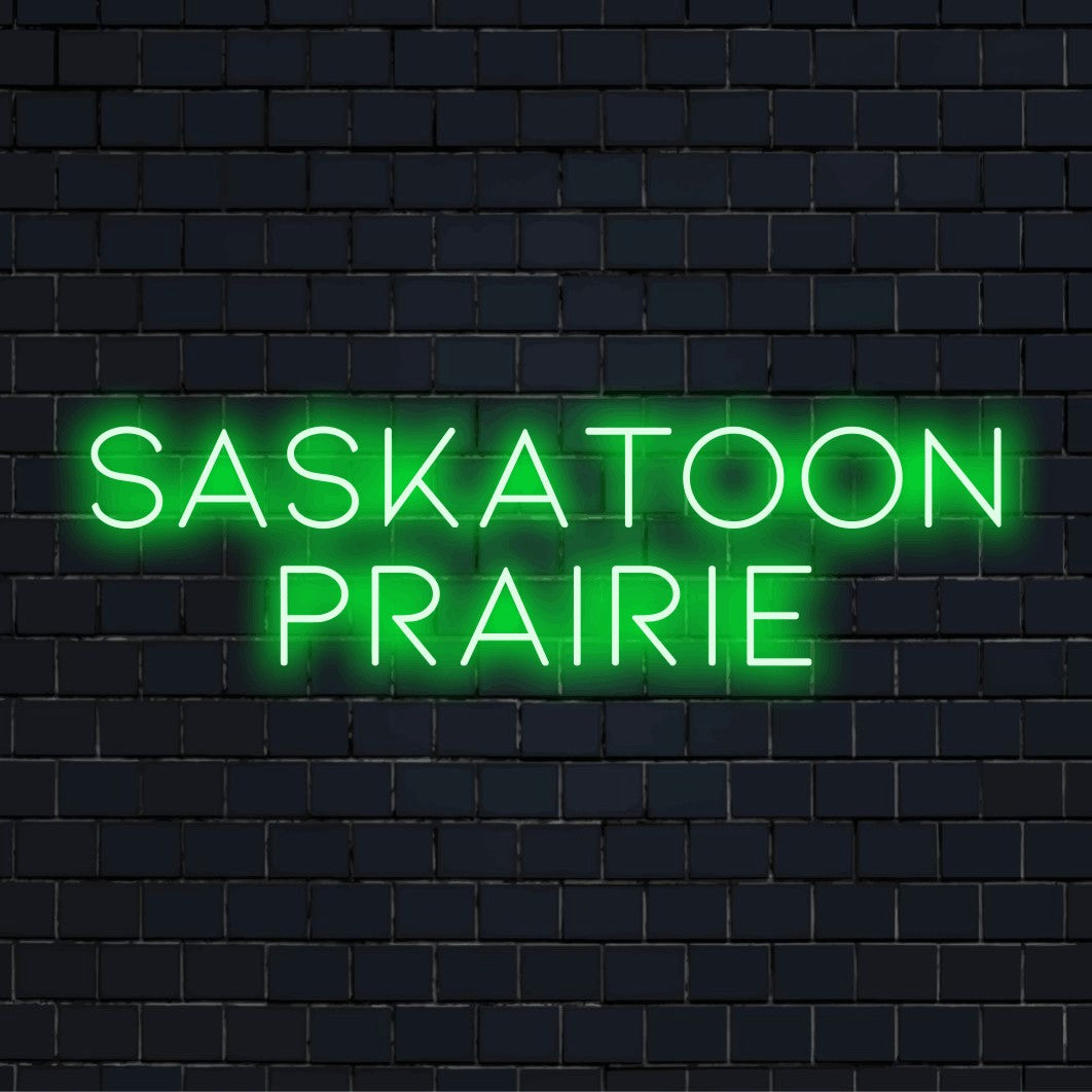Saskatoon Prairie LED Neon Sign, glowing neon text on dark brick wall