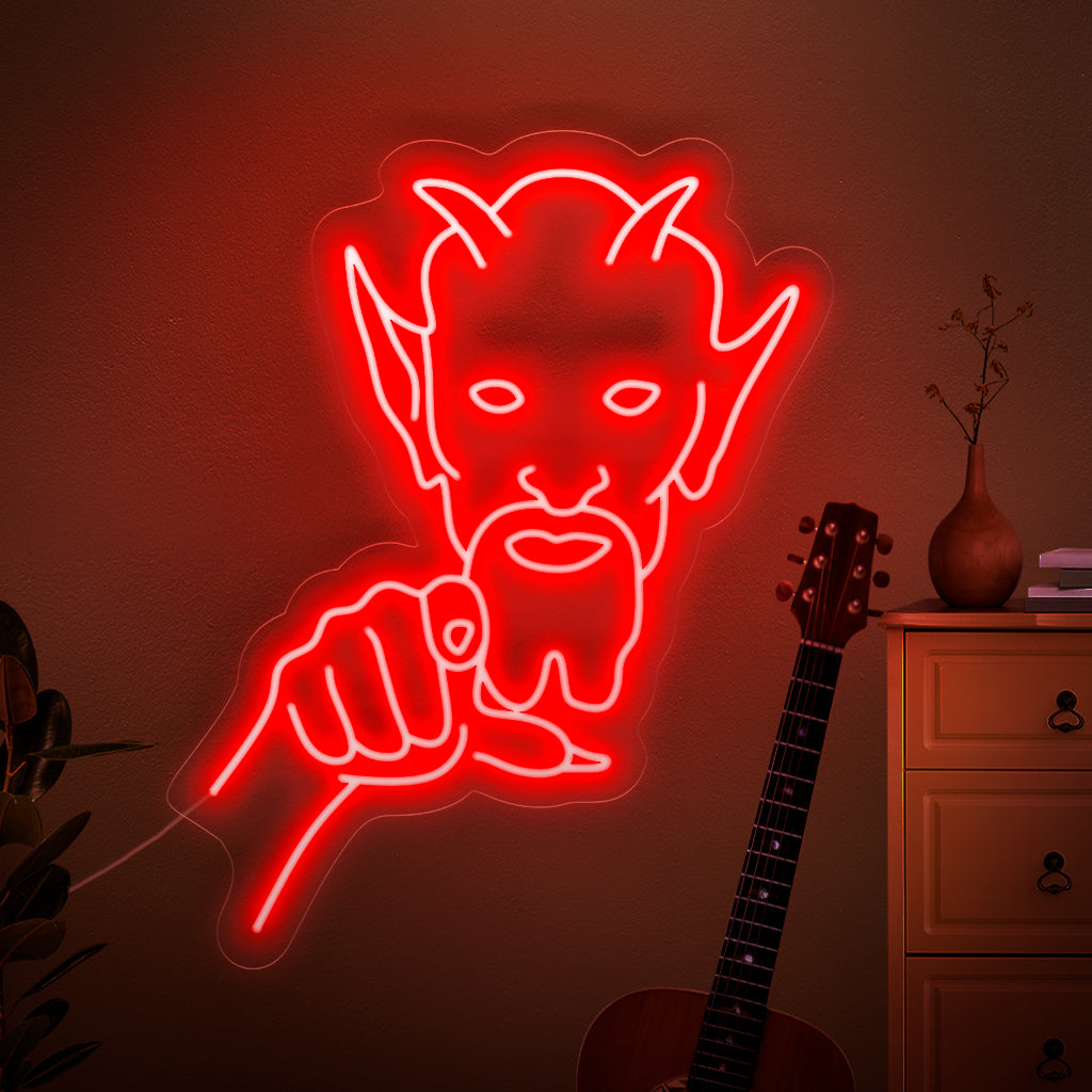 Kummittava neonkyltti, jossa uhkaava demoni osoittaa suoraan sinuun luoden pelon ja levottomuuden tunteen.