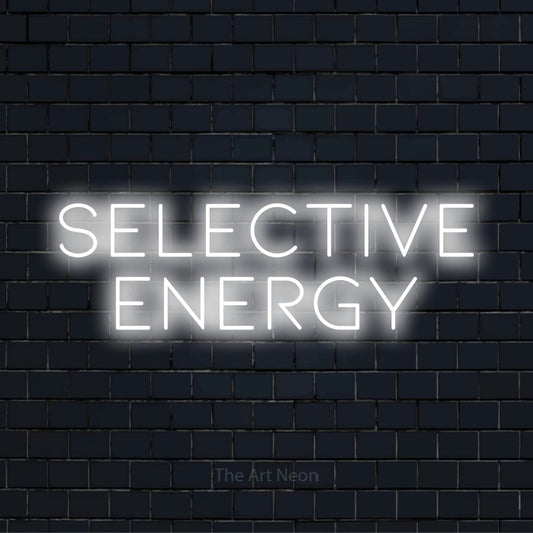 "Selective Energy" neon text design on a black brick wall