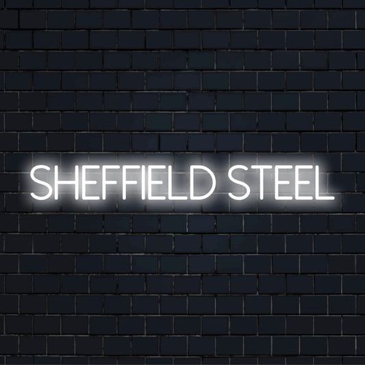 Sheffield Steel LED Neon Sign, neon text light against brick backdrop